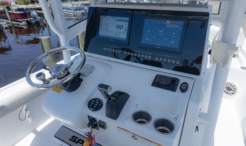 Slide: The Image of 2019 Sportsman Masters 267 Bay Boat helm with modern instruments. - 20