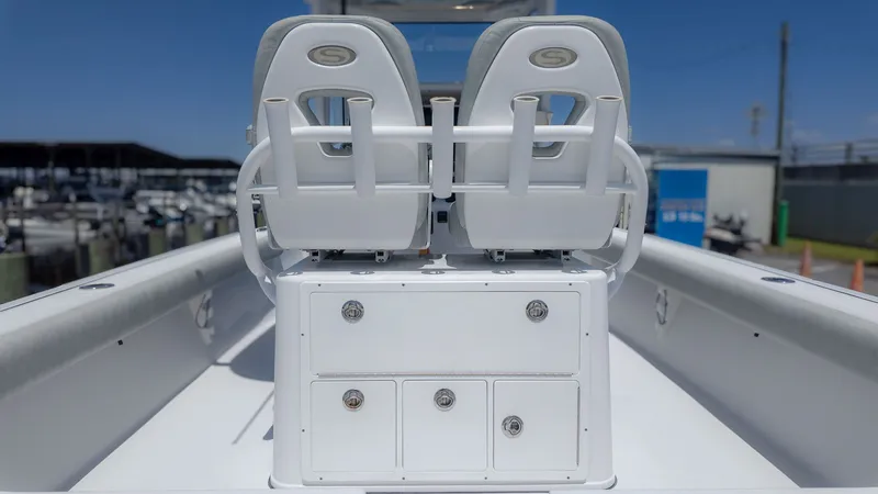 Slide: The Image of 2019 Sportsman Masters 267 Bay Boat with dual seats and storage. - 22