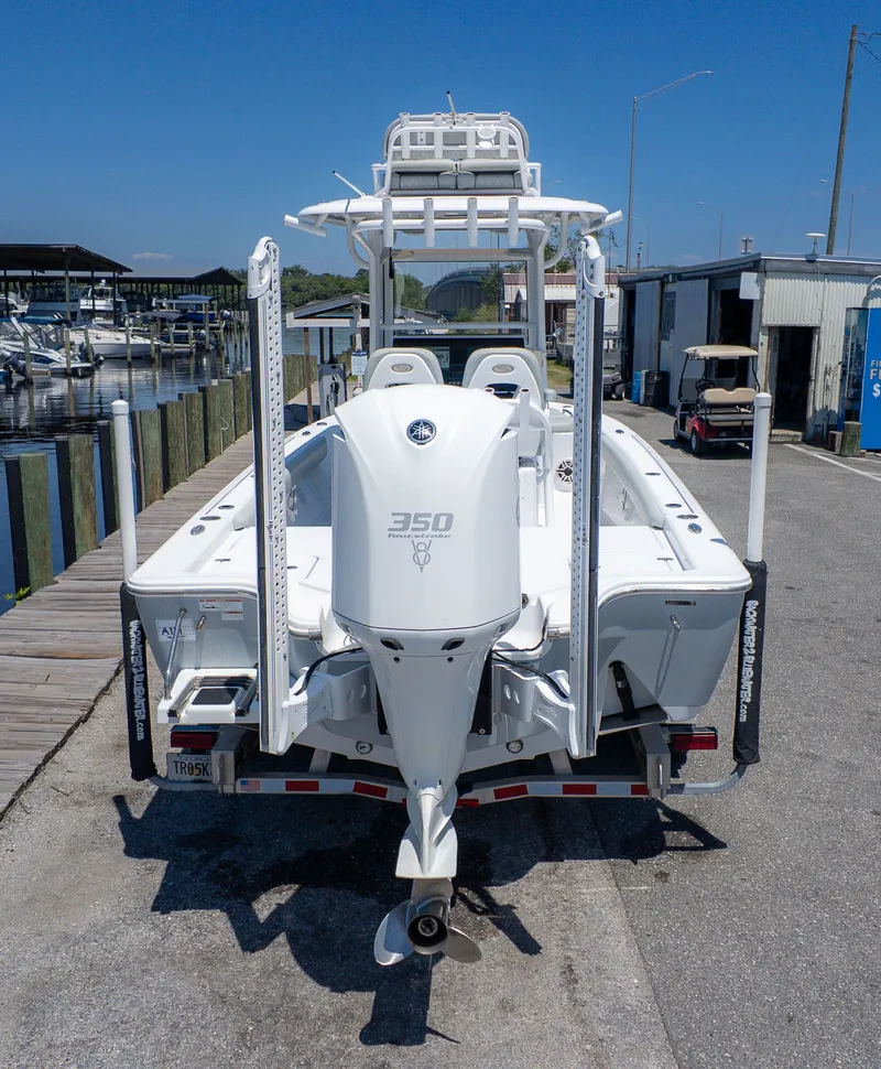 Slide: The Image of 2019 Sportsman Masters 267 Bay Boat parked at dock. - 5