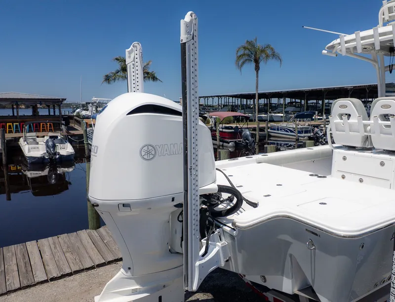 Slide: The Image of 2019 Sportsman Masters 267 Bay Boat with Yamaha engine at dock. - 6