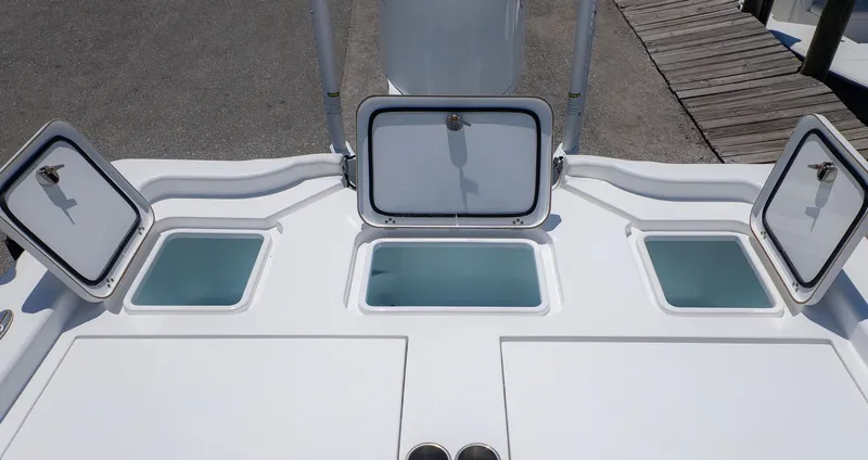 Slide: The Image of 2019 Sportsman Masters 267 Bay Boat with open storage compartments. - 8