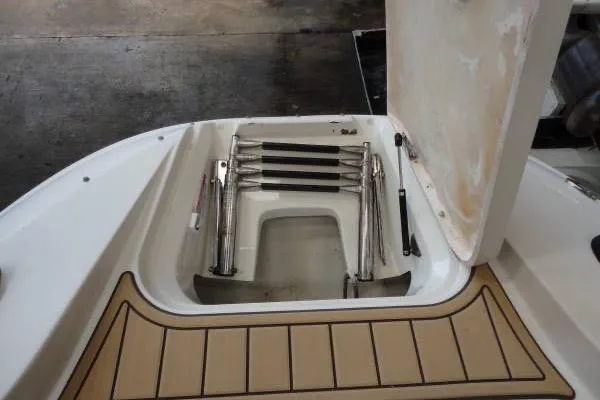 Slide: The Image of 2007 Sea Ray 260 Sundeck swim platform with retractable ladder. - 16
