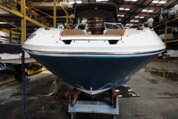 Slide: The Image of 2007 Sea Ray 260 Sundeck boat in storage, front view. - 3