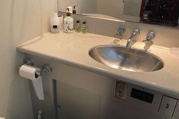 Slide: The Image of Bathroom sink area on 1983 Hatteras 53 Extended Deckhouse Motor Yacht. - 12