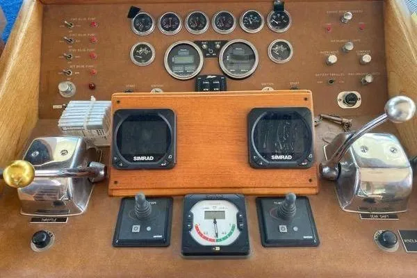 Slide: The Image of Control panel of a 1983 Hatteras 53 Extended Deckhouse Motor Yacht with navigation instruments. - 25
