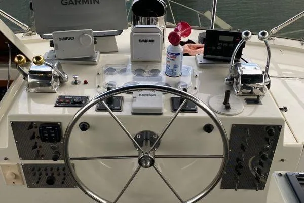 Slide: The Image of 1983 Hatteras 53 Extended Deckhouse Motor Yacht helm with navigation equipment and controls. - 31