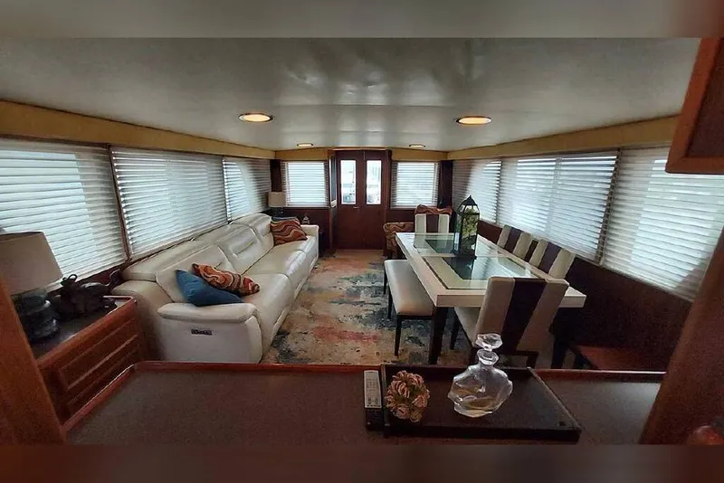 Slide: The Image of Luxurious interior of 1983 Hatteras 53 Extended Deckhouse Motor Yacht with elegant furnishings. - 44