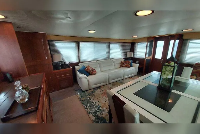 Slide: The Image of Luxurious interior of 1983 Hatteras 53 Extended Deckhouse Motor Yacht with elegant furnishings. - 47