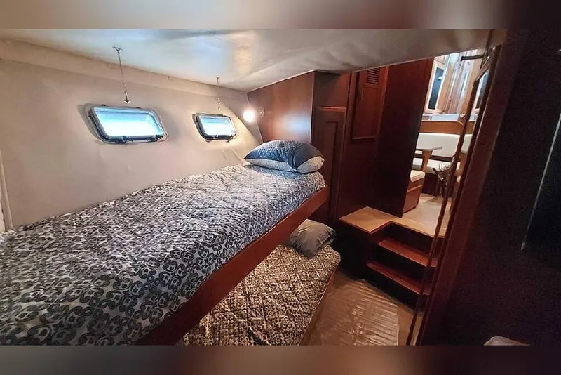 Slide: The Image of Interior cabin of 1983 Hatteras 53 Extended Deckhouse Motor Yacht with bunk beds. - 50