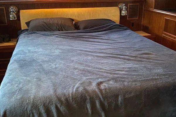 Slide: The Image of Luxurious bedroom interior of 1983 Hatteras 53 Extended Deckhouse Motor Yacht. - 9