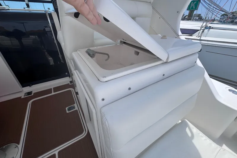 Slide: The Image of Open storage compartment on a 2001 Tiara Yachts 3500 Open boat deck. - 16
