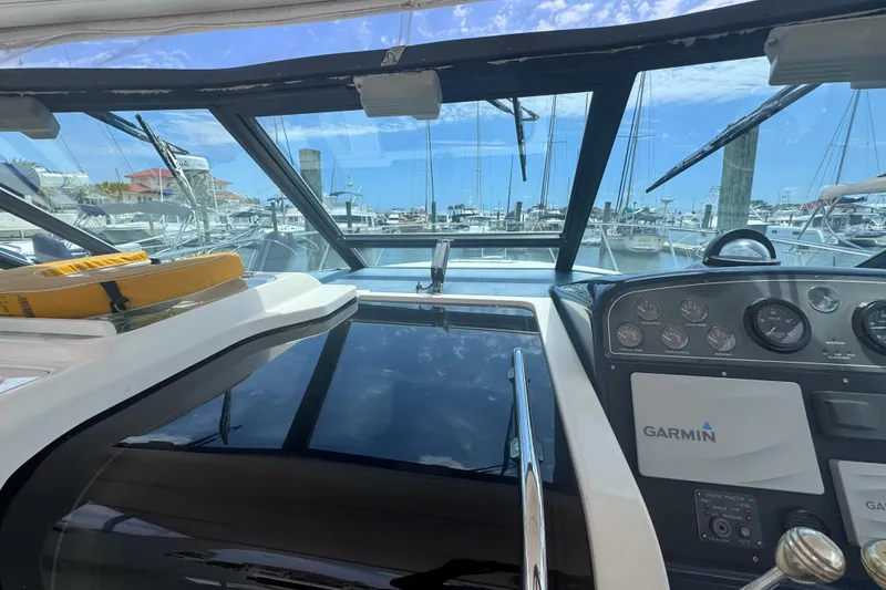 Slide: The Image of Cockpit view of 2001 Tiara Yachts 3500 Open with Garmin navigation system at marina. - 26