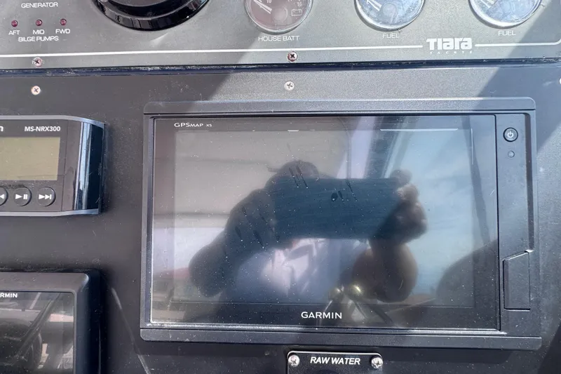 Slide: The Image of Control panel of a 2001 Tiara Yachts 3500 Open with Garmin GPSMAP display. - 28