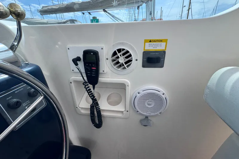 Slide: The Image of Control panel of a 2001 Tiara Yachts 3500 Open with radio and speaker. - 31