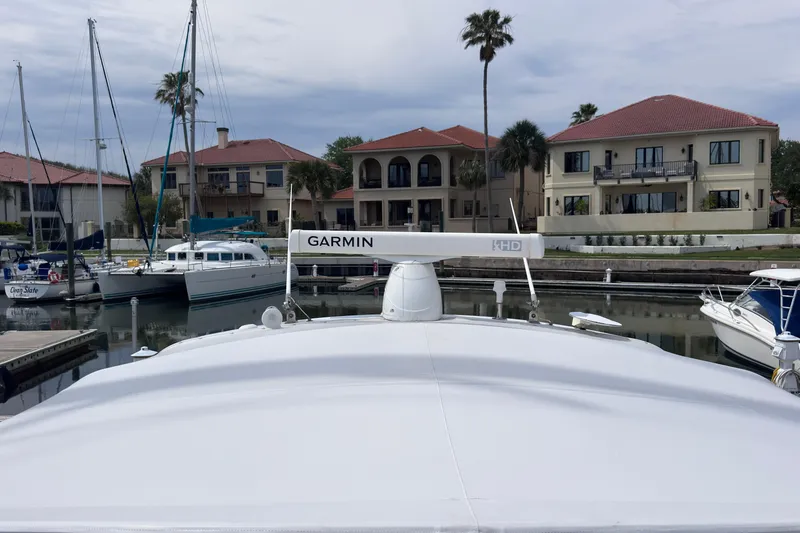 Slide: The Image of Tiara Yachts 3500 Open 2001 docked in marina with Garmin radar. - 35