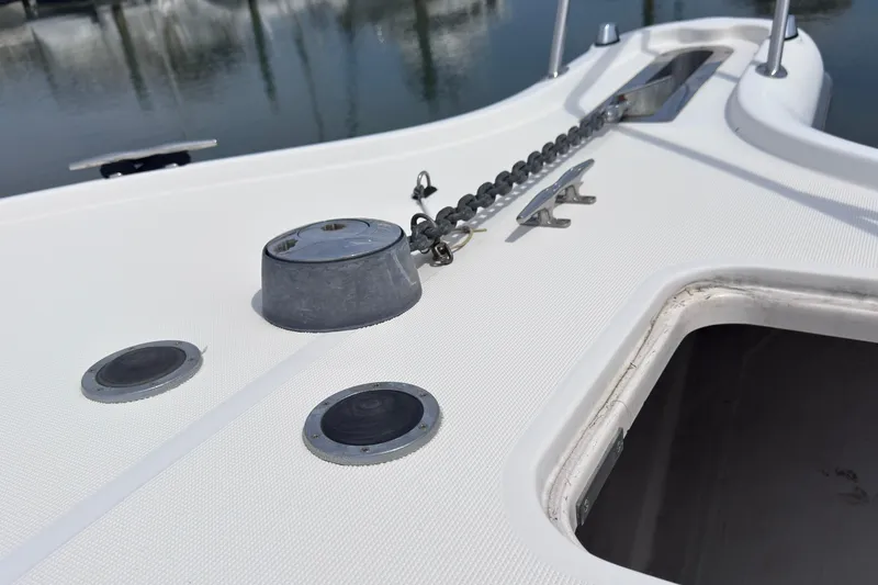Slide: The Image of Deck of 2001 Tiara Yachts 3500 Open with anchor chain and cleat. - 38