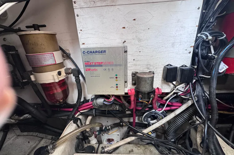 Slide: The Image of Engine compartment of a 2001 Tiara Yachts 3500 Open with C-Charger and wiring. - 43