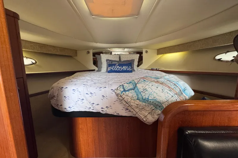 Slide: The Image of Cozy cabin interior of 2001 Tiara Yachts 3500 Open with welcoming decor. - 49