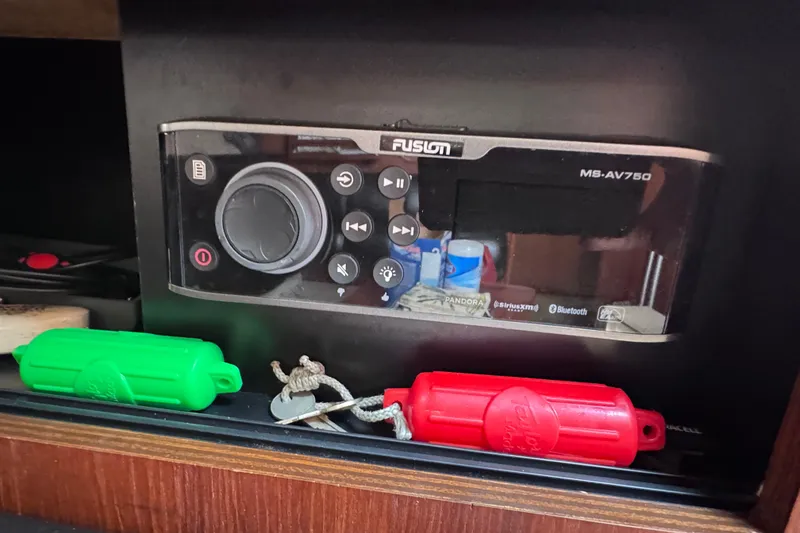 Slide: The Image of Fusion MS-AV750 stereo system on 2001 Tiara Yachts 3500 Open, with green and red safety devices. - 63