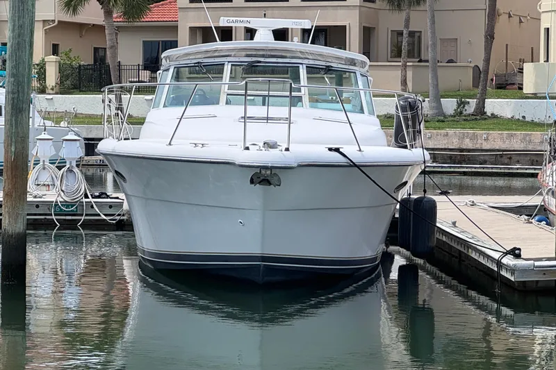 Slide: The Image of 2001 Tiara Yachts 3500 Open docked at marina, front view. - 7
