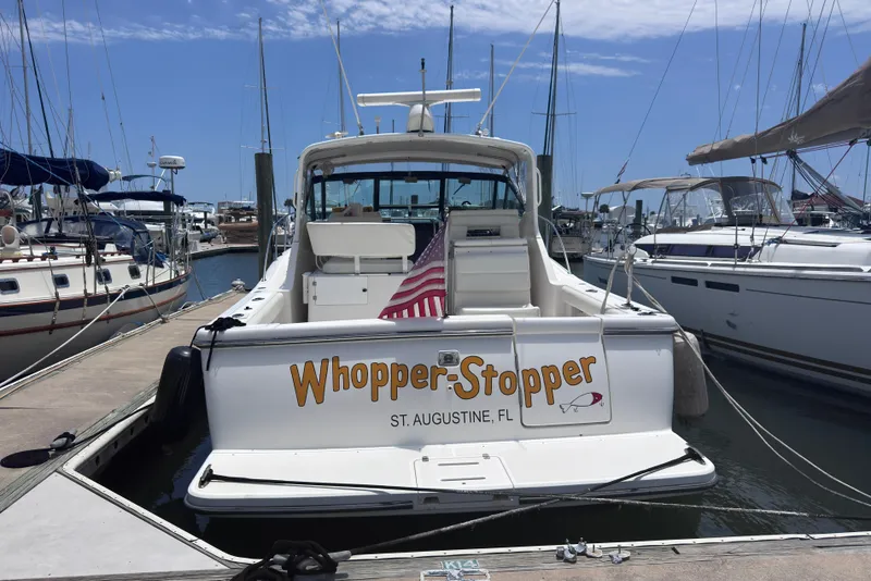 Slide: The Image of 2001 Tiara Yachts 3500 Open docked, named "Whopper-Stopper," in St. Augustine marina. - 8