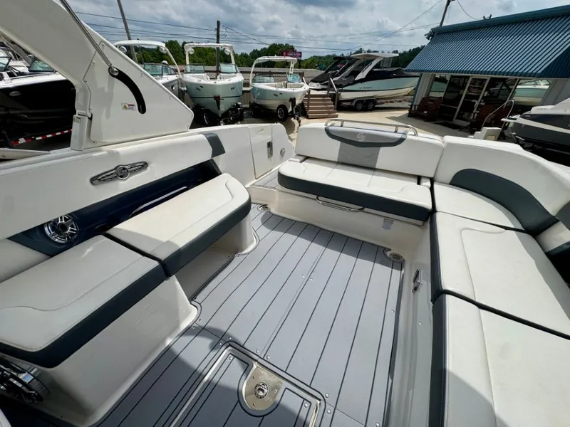 Slide: The Image of Interior of 2021 Chaparral 30 Surf with gray and white seating. - 18