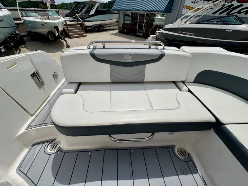 Slide: The Image of Chaparral 30 Surf 2021 boat rear seating area outdoors. - 19