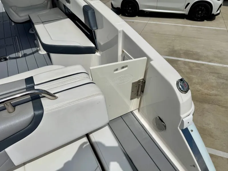 Slide: The Image of Interior of a 2021 Chaparral 30 Surf boat with seating area. - 24