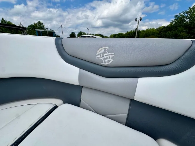 Slide: The Image of Interior of 2021 Chaparral 30 Surf with gray upholstery. - 35