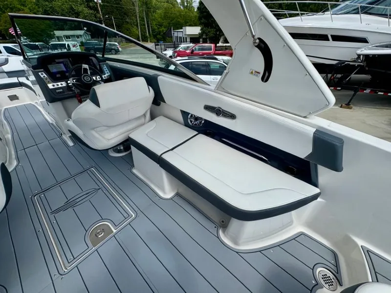 Slide: The Image of Interior of a 2021 Chaparral 30 Surf boat with seating area. - 38