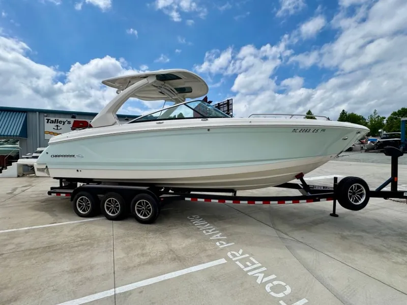 Slide: The Image of 2021 Chaparral 30 Surf boat on trailer outdoors. - 6