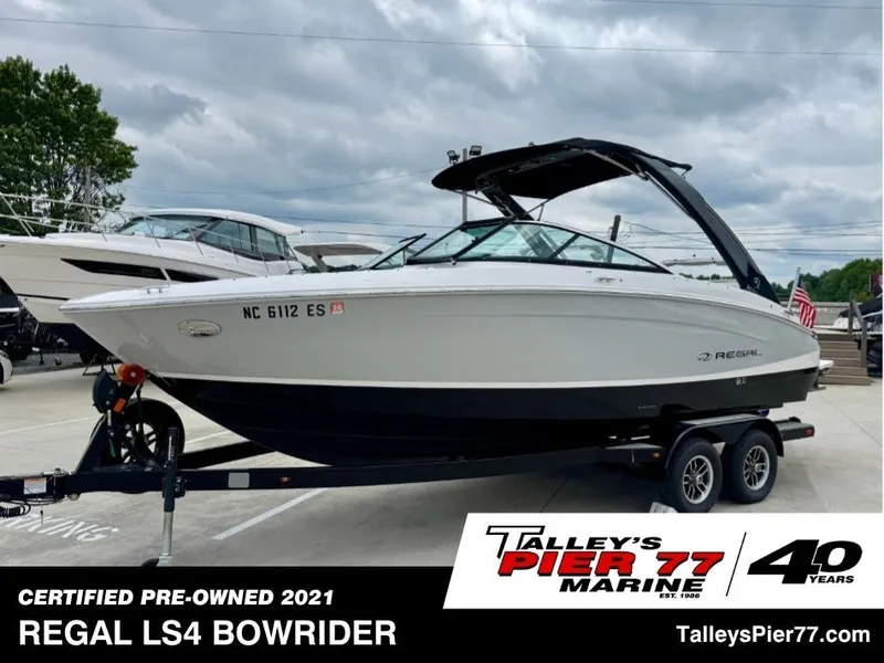 The Image of 2021 Regal LS4 Bowrider on trailer at Talley's Pier 77 Marine. - 1