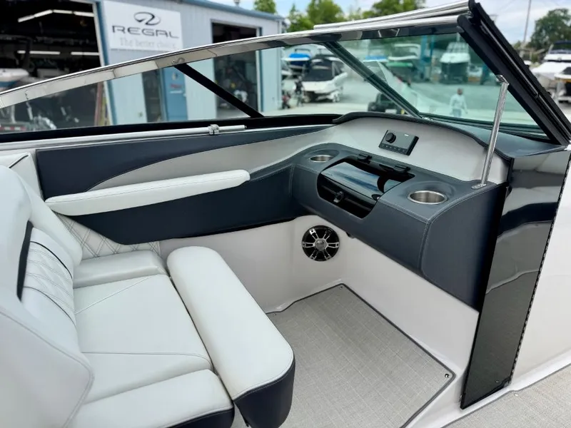 Slide: The Image of Interior of a 2021 Regal LS4 boat with luxurious features. - 13