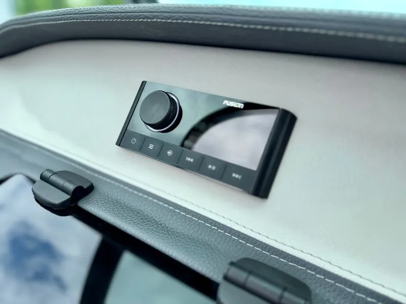 Slide: The Image of 2021 Regal LS4 boat with Fusion audio system. - 14