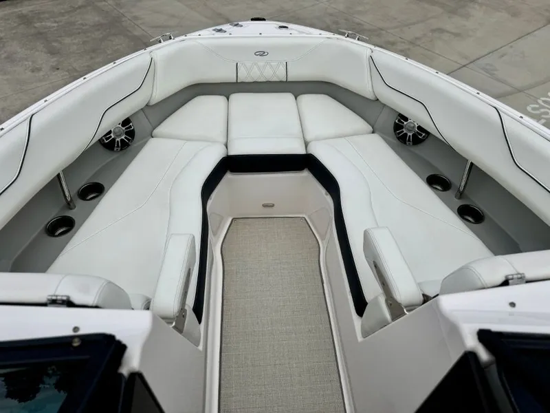 Slide: The Image of Interior of a 2021 Regal LS4 boat with white upholstery. - 15