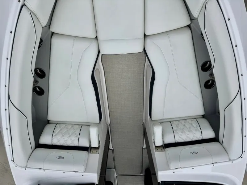 Slide: The Image of Interior of a 2021 Regal LS4 boat with white leather seats. - 19