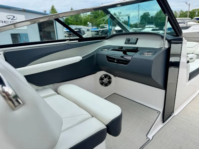 Slide: The Image of Interior of a 2021 Regal LS4 boat with luxurious features. - 21