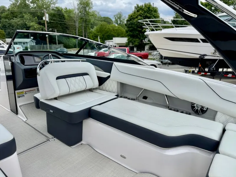 Slide: The Image of Interior of a 2021 Regal LS4 boat with luxurious seating. - 25