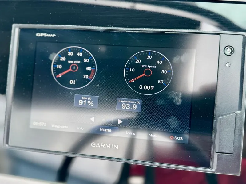Slide: The Image of Garmin GPS display on Regal LS4 boat, showing speed and engine hours. - 28
