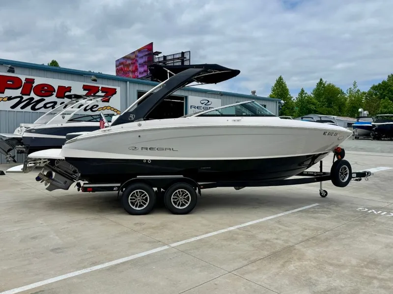 Slide: The Image of 2021 Regal LS4 boat on trailer at Pier 77 Marine. - 3