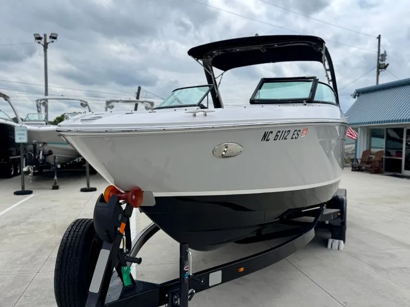 Slide: The Image of 2021 Regal LS4 boat on trailer, side view. - 8