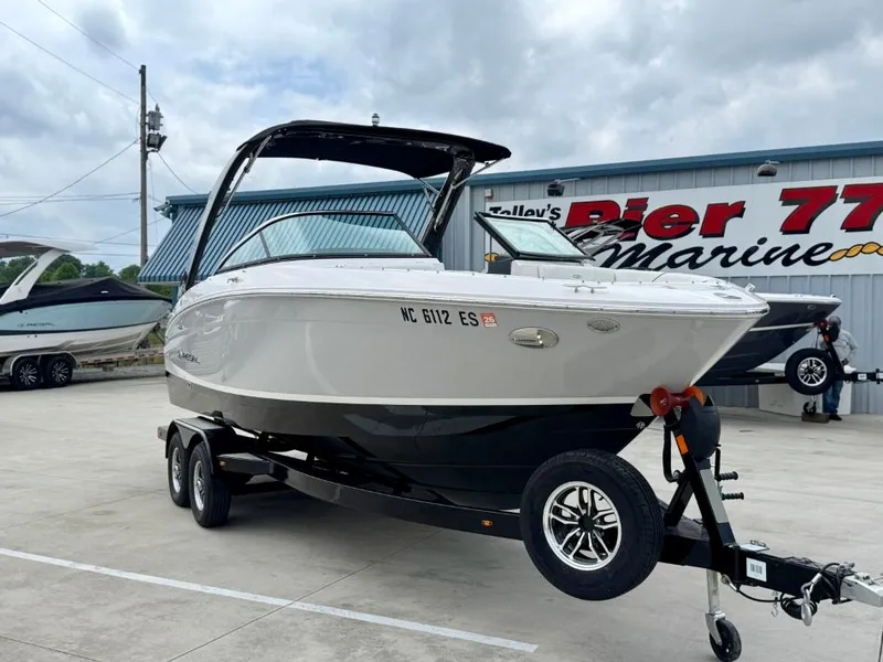 Slide: The Image of 2021 Regal LS4 boat on trailer at Pier 77 Marine. - 9
