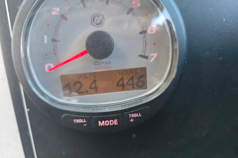 Slide: The Image of Close-up of Alumaweld Intruder Outboard 20 gauge showing 12.4 volts and 446 hours. - 16