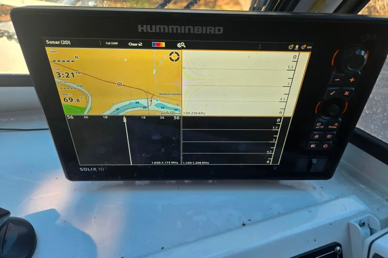 Slide: The Image of Humminbird sonar display on 2021 Alumaweld Intruder Outboard 20 boat dashboard. - 20