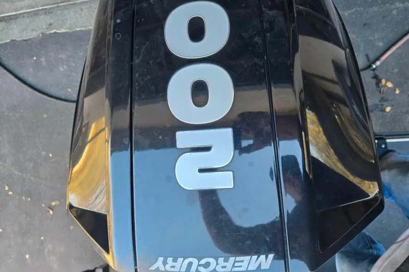 Slide: The Image of Mercury 200 outboard motor on a 2021 Alumaweld Intruder Outboard 20 boat. - 9