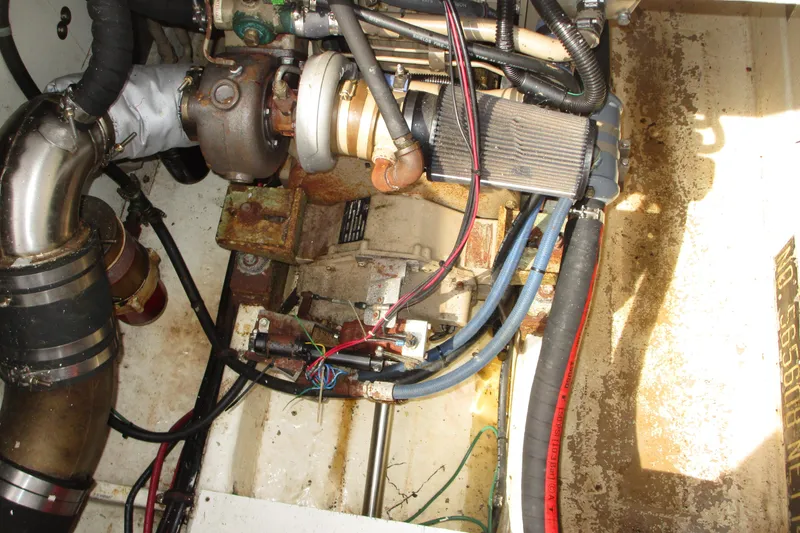Slide: The Image of Engine compartment of a 1972 Uniflite 36 Sport Sedan, showing mechanical components and wiring. - 12