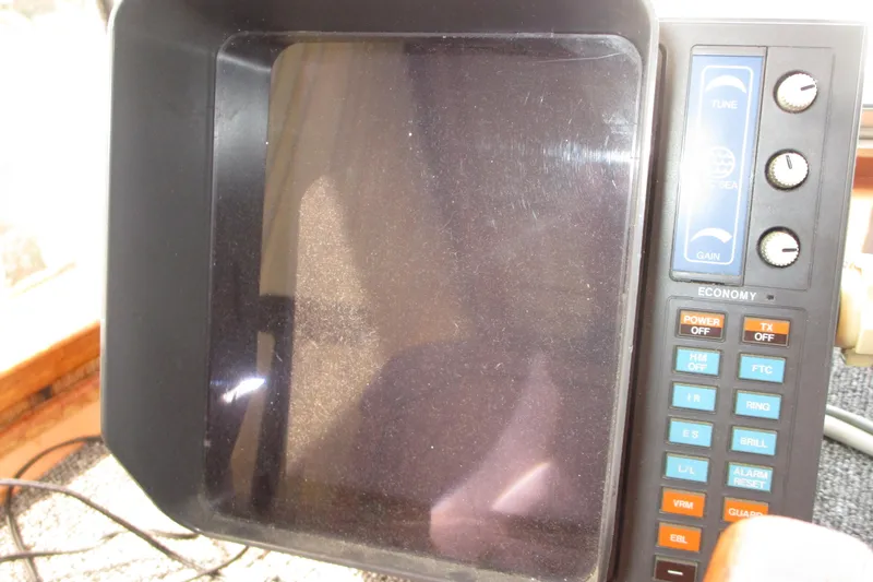 Slide: The Image of Close-up of a vintage marine radar display on a 1972 Uniflite 36 Sport Sedan. - 25