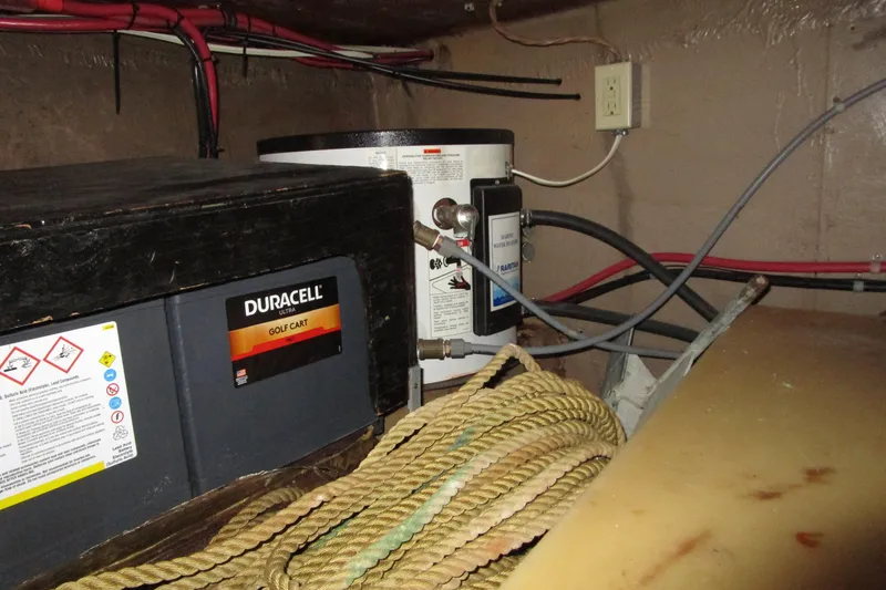 Slide: The Image of Battery and wiring setup in a 1972 Uniflite 36 Sport Sedan boat. - 39