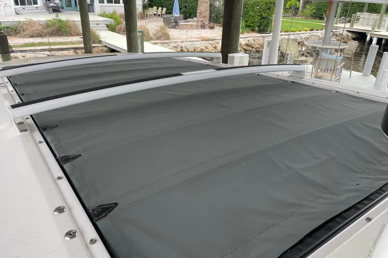 Slide: The Image of 2021 Axopar 28 Cabin roof detail with sleek design and durable materials. - 14