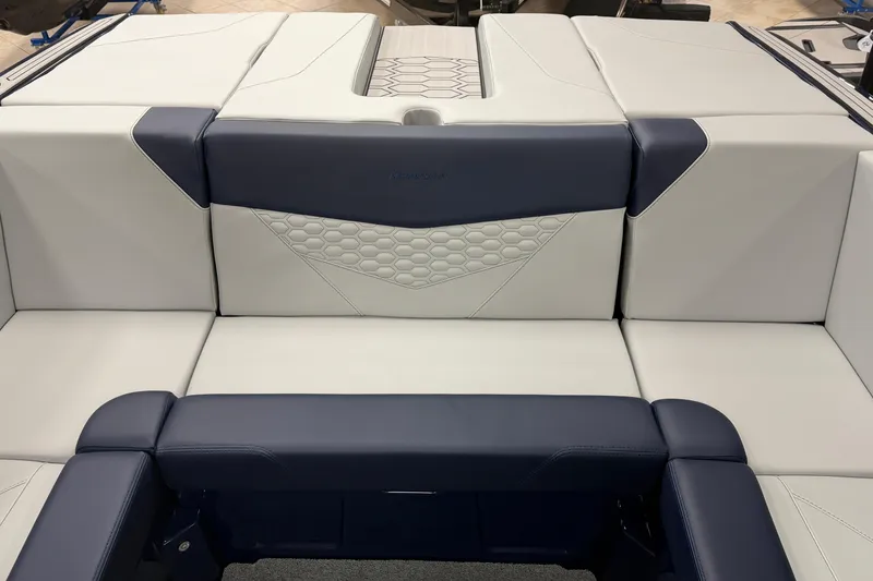 Slide: The Image of 2026 MasterCraft NXT20 boat interior with sleek, modern upholstery design. - 9